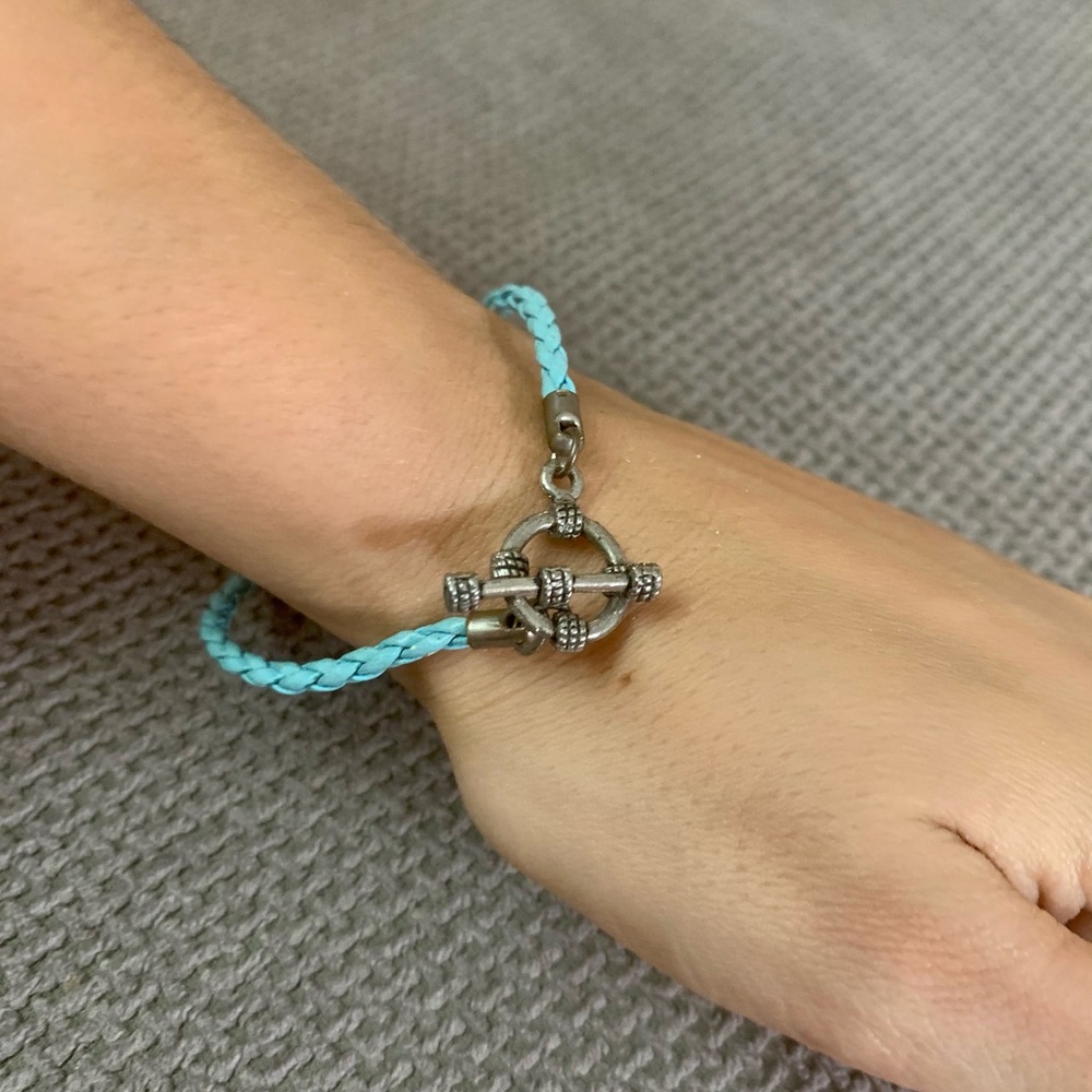 Blue leather rope bracelet with circle closure